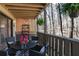 Relaxing covered patio with outdoor seating, ideal for enjoying the scenery at 210 Woodcliff Dr, Atlanta, GA 30350