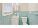 Bathroom featuring blue tiling on the walls and floor at 3001 Will Rogers Se Pl, Atlanta, GA 30316