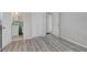 Bedroom featuring wood floors and access to an ensuite bathroom at 3001 Will Rogers Se Pl, Atlanta, GA 30316