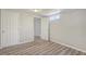 This bedroom features gray vinyl flooring and white paneled walls at 3001 Will Rogers Se Pl, Atlanta, GA 30316