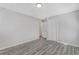 This bedroom has grey vinyl floors and a double door closet at 3001 Will Rogers Se Pl, Atlanta, GA 30316