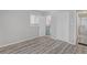 Bedroom featuring wood floors and access to an ensuite bathroom at 3001 Will Rogers Se Pl, Atlanta, GA 30316