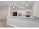 A kitchen view showcasing granite countertops, modern lighting and stainless steel appliances at 3001 Will Rogers Se Pl, Atlanta, GA 30316