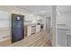 Bright kitchen featuring white cabinets, granite countertops, and modern stainless steel appliances at 3001 Will Rogers Se Pl, Atlanta, GA 30316
