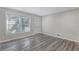 Bright living room with gray laminate flooring and plenty of natural light at 3001 Will Rogers Se Pl, Atlanta, GA 30316