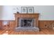 Brick fireplace featuring decorative details and mantle at 3590 Lester Sw Ct, Lilburn, GA 30047