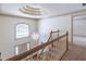Grand foyer showcasing a chandelier, staircase, and large arched window at 3590 Lester Sw Ct, Lilburn, GA 30047