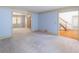 Open floor plan with living room that connects to staircase and other rooms at 3590 Lester Sw Ct, Lilburn, GA 30047