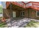 Covered patio area with brick accents, ideal for outdoor gatherings and entertaining at 3590 Lester Sw Ct, Lilburn, GA 30047