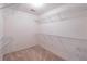 Walk-in closet with carpeted flooring and wire shelving at 3590 Lester Sw Ct, Lilburn, GA 30047