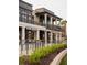 Elegant two-story building with a Los Rios restaurant and outdoor seating at 636 Silva St, Cumming, GA 30040
