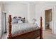 Bedroom featuring a four post bed and ensuite bathroom at 1186 Arbor Park Sw Ln, Atlanta, GA 30311