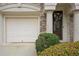 Charming home exterior featuring a well-manicured lawn, attached garage, and inviting front entrance at 1186 Arbor Park Sw Ln, Atlanta, GA 30311