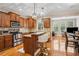 Well-equipped kitchen with granite countertops, stainless steel appliances and eat-in breakfast bar at 1186 Arbor Park Sw Ln, Atlanta, GA 30311