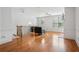 Bright living room with hardwood floors, crown molding, and a cozy seating arrangement at 1186 Arbor Park Sw Ln, Atlanta, GA 30311