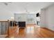 Bright living room with hardwood floors, fireplace, crown molding, and a ceiling fan at 1186 Arbor Park Sw Ln, Atlanta, GA 30311
