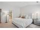Elegant main bedroom with a plush bed, decorative pillows, and stylish nightstands at 1186 Arbor Park Sw Ln, Atlanta, GA 30311