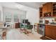 Bright office with ample natural light, desk area, and built-in bar, perfect for working from home and entertaining at 1186 Arbor Park Sw Ln, Atlanta, GA 30311