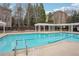 Inviting community pool featuring clear blue water, a diving board, and a well-maintained deck area at 1186 Arbor Park Sw Ln, Atlanta, GA 30311