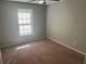 Comfortable bedroom with ceiling fan and natural light and neutral walls, perfect for relaxing at 2039 Corners Cir, Lithonia, GA 30058