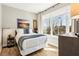 Comfortable bedroom with natural light, complemented by wood floors and tasteful decor at 22 Airline Ne St # 204, Atlanta, GA 30312