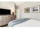 Bedroom features a spacious layout with a large dresser, modern decor, and comfortable bedding at 22 Airline Ne St # 204, Atlanta, GA 30312
