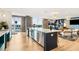 Stylish community room featuring a modern kitchen island and comfortable seating areas at 22 Airline Ne St # 204, Atlanta, GA 30312