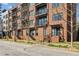 Brick condominium building with multiple levels and private balconies at 22 Airline Ne St # 204, Atlanta, GA 30312