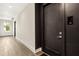 Hallway features a door and window with lots of light and laminate floors at 22 Airline Ne St # 204, Atlanta, GA 30312