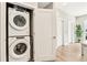 Convenient laundry area with a stacked washer and dryer unit, maximizing space and efficiency at 22 Airline Ne St # 204, Atlanta, GA 30312