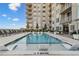 Inviting swimming pool with lounge chairs and poolside seating for relaxing and enjoying the outdoors at 22 Airline Ne St # 204, Atlanta, GA 30312