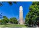 Scenic view of historic water tower surrounded by lush greenery and a clear blue sky at 22 Airline Ne St # 204, Atlanta, GA 30312