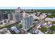 A high-rise building presents a stunning aerial view of the city skyline and lush green landscape at 250 Pharr Ne Rd # 2101, Atlanta, GA 30305