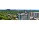 Scenic aerial view of the condo building with lush greenery and city skyline views at 250 Pharr Ne Rd # 2101, Atlanta, GA 30305