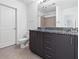Bathroom with double vanity, granite countertop, and neutral color scheme at 250 Pharr Ne Rd # 2101, Atlanta, GA 30305