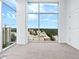 Empty bedroom with stunning cityscape view through large windows at 250 Pharr Ne Rd # 2101, Atlanta, GA 30305