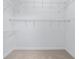 Walk-in closet with wire shelving and carpeted floor at 250 Pharr Ne Rd # 2101, Atlanta, GA 30305