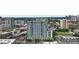 An exterior view showcases a modern high-rise with multiple floors and beautiful architectural design at 250 Pharr Ne Rd # 2101, Atlanta, GA 30305