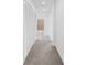 Hallway featuring storage closets and bathroom access, providing functional living space at 250 Pharr Ne Rd # 2101, Atlanta, GA 30305