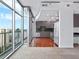 Modern kitchen featuring sleek gray cabinets, hardwood floors, and stainless steel appliances at 250 Pharr Ne Rd # 2101, Atlanta, GA 30305