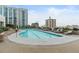 Rooftop pool with plenty of lounge chairs and building views at 250 Pharr Ne Rd # 2101, Atlanta, GA 30305