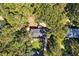A home is nestled among lush greenery, providing a sense of seclusion and natural beauty to the property at 2615 Holly Ln, Marietta, GA 30062