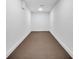 Unfinished basement space with neutral carpet at 2615 Holly Ln, Marietta, GA 30062