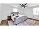 Serene bedroom with plush bedding, soft lighting, and neutral tones offers a cozy retreat at 2615 Holly Ln, Marietta, GA 30062