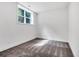 Bright bedroom featuring neutral carpet, fresh white paint, and natural light from a window at 2615 Holly Ln, Marietta, GA 30062