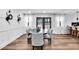 Bright dining room with stylish wall decor and an open view of the kitchen at 2615 Holly Ln, Marietta, GA 30062