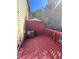 A spacious deck area with vibrant red paint, perfect for outdoor relaxation and entertaining at 4006 Bayside Cir, Atlanta, GA 30340