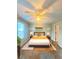 Inviting bedroom with a ceiling fan and a comfortable bed complemented by stylish decor at 4006 Bayside Cir, Atlanta, GA 30340
