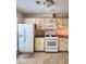 Functional kitchen featuring modern appliances, ample cabinetry, and a tiled backsplash at 4006 Bayside Cir, Atlanta, GA 30340