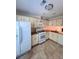 Well-equipped kitchen featuring tile floors, modern appliances and plenty of counter space at 4006 Bayside Cir, Atlanta, GA 30340